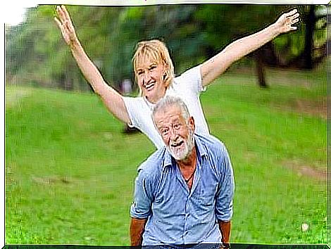 An older couple having fun