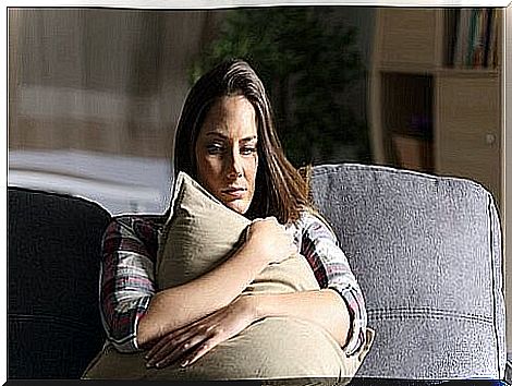 A woman sitting on a sofa