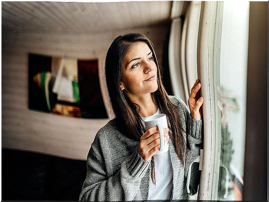 Woman thinking of Einhorn's theory of happiness