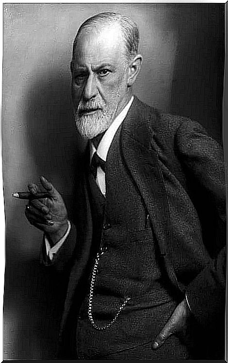 Black and white photograph of Sigmund Freud with cigarette