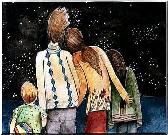 happy family looking at the stars