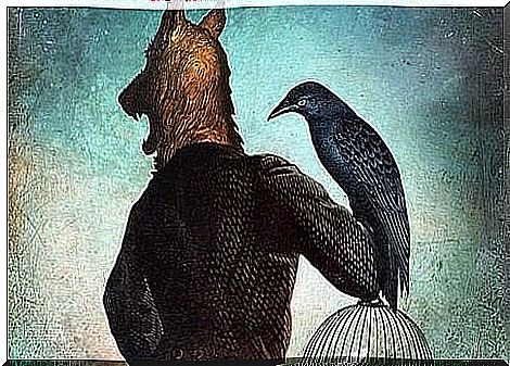 Person with wolf head holding black bird