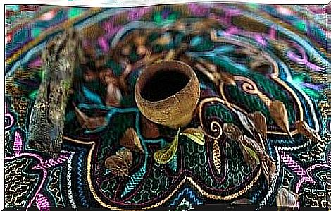 Ayahuasca in a cup on a gargling cloth.