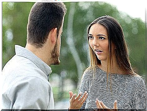 Two people are discussing or arguing about something.