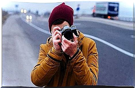 Person taking a photograph