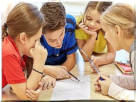 Children collaborating in a school lesson.